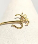 OM bangle symbol closeup