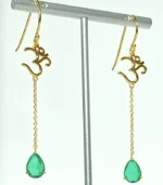 OM gold earrings side