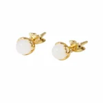 white jade stud earrings heart detail white background
