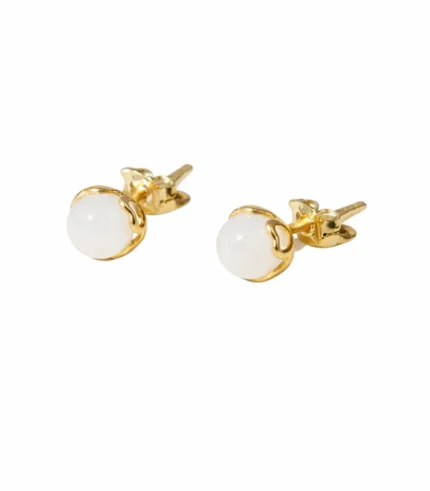 white jade stud earrings heart detail white background