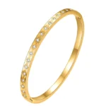 gold bangle bracelet with diamond pattern CZ crystals in 18K gold plated stainless steel
