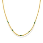 green crystal herringbone necklace in 18K gold plated stainless steel