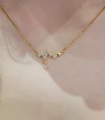 Gold Heartbeat Crystal Drop Necklace - Image 3