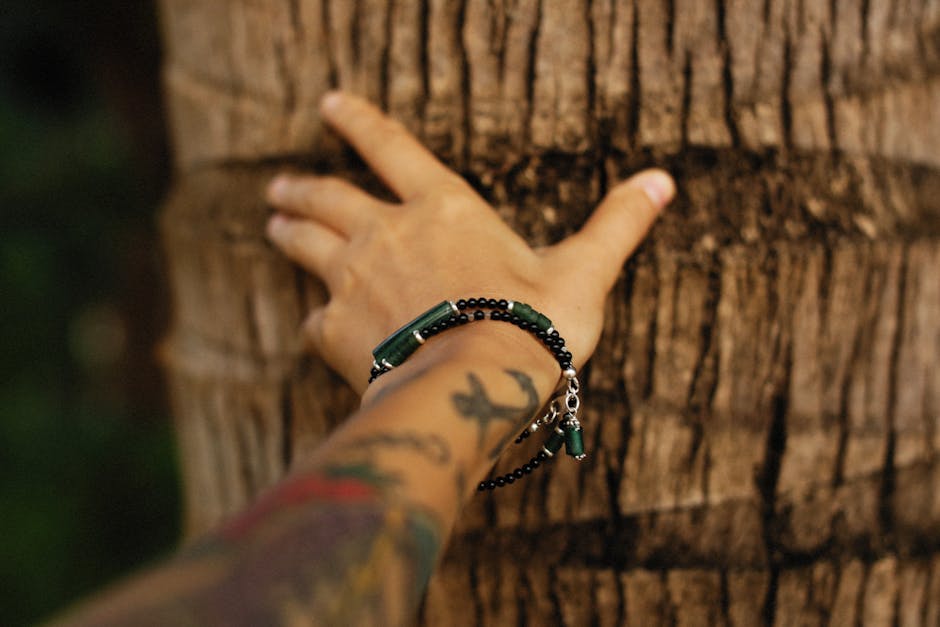 gold ornate concentric disc pendant necklace with peach stone in 18K gold plated stainless steel