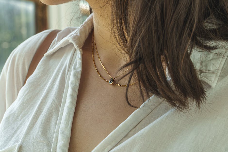 gold evil eye pendant necklace on twisted gold chain in 18K gold plated stainless steel